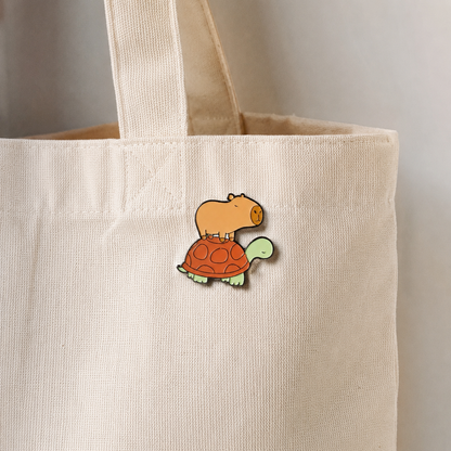 Pin's émail Capybara sur Tortue (PROMO -20%)