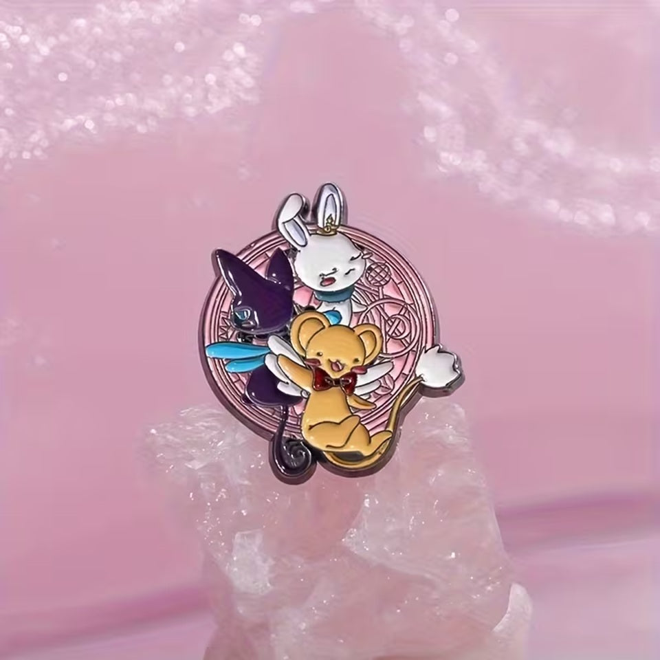 un pin's réunissant Kerobero, Spinel Sun et Monsieur Lapinou de l'univers magique et enchanteur de Card Captor Sakura.