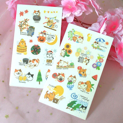 des planches de stickers représentant des chats de toutes les couleurs dans des scènes de la vie et des traditions japonaises : hanami, feux d'artifice, koi nobori etc...