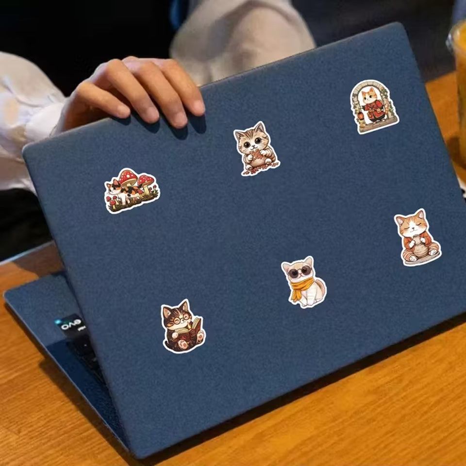 des stickers représentant des chats dans diverses scènes de la vie quotidienne. Ils sont adorables et parfaits pour le scrapbooking.