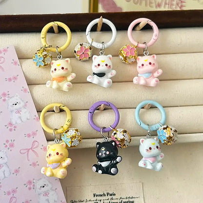 des porte-clés en forme de chat kawaii colorés et super mignons, accompagné d'un superbe grelot sakura. Idéal pour vos clés ou décorer un sac.