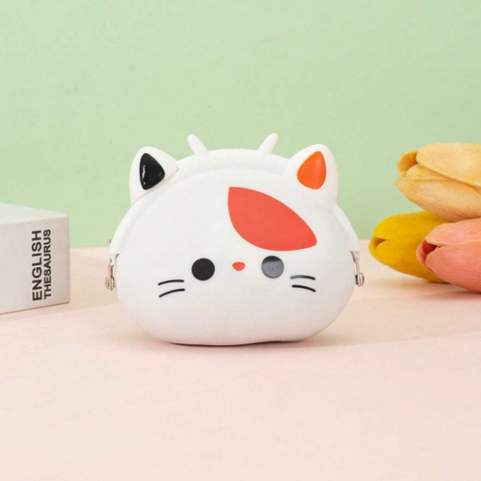 un adorable porte-monnaie en forme d'une tête de chat calico. Expression kawaii et douce. Idéale pour la monnaie, les petits trésors.