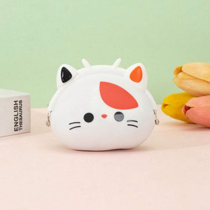 un adorable porte-monnaie en forme d'une tête de chat calico. Expression kawaii et douce. Idéale pour la monnaie, les petits trésors.