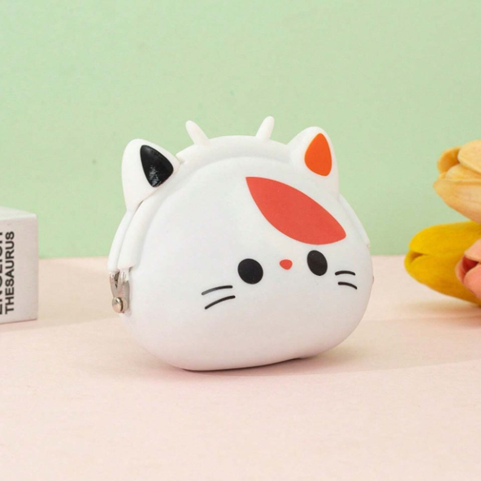 un adorable porte-monnaie en forme d'une tête de chat calico. Expression kawaii et douce. Idéale pour la monnaie, les petits trésors.