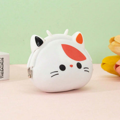 un adorable porte-monnaie en forme d'une tête de chat calico. Expression kawaii et douce. Idéale pour la monnaie, les petits trésors.