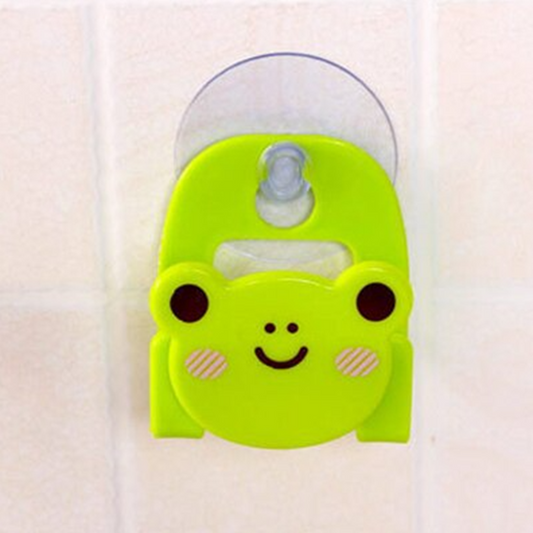 un porte éponge en forme de grenouille verte très mignonne pour y ranger votre éponge. 