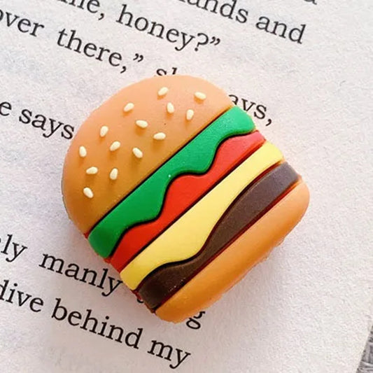 un protège câble en forme de hamburger hyper rigolo et mignon. Il protège vos câbles et allonge leur durée de vie en ajoutant une touche amusante !