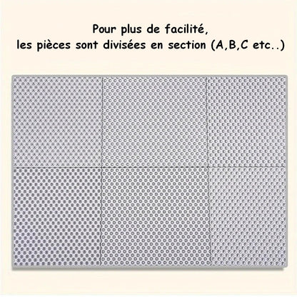 un puzzle composé de 1000pièces reprenant la scène où Mei, Satsuki, Totoro et les chibi pêchent sur une grosse branche d'arbre.