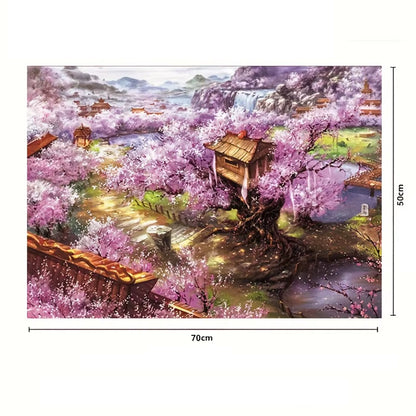 un puzzle de 1000 pièces représentant un paysage japonais : au loin des montagnes mystérieuses, une vallée remplie de sakura en fleurs dans un petit village aux toits typiques, pagodes et rivière.