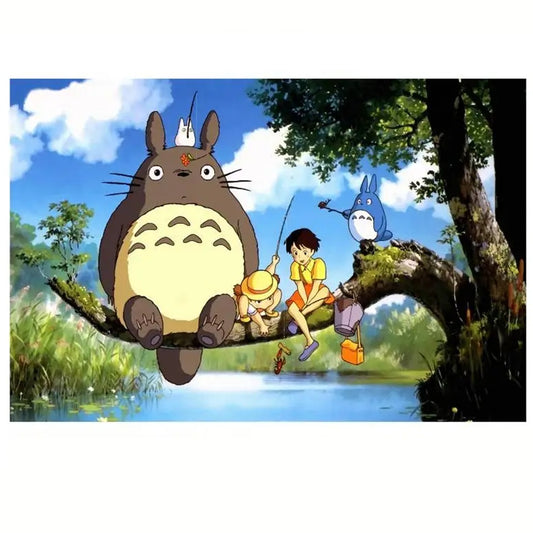 un puzzle composé de 1000pièces reprenant la scène où Mei, Satsuki, Totoro et les chibi pêchent sur une grosse branche d'arbre.