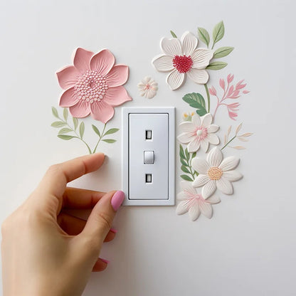 un sticker mural en forme de fleurs roses et blanches avec de jolies feuilles vertes. Touche déco florale, printanière, douce.
