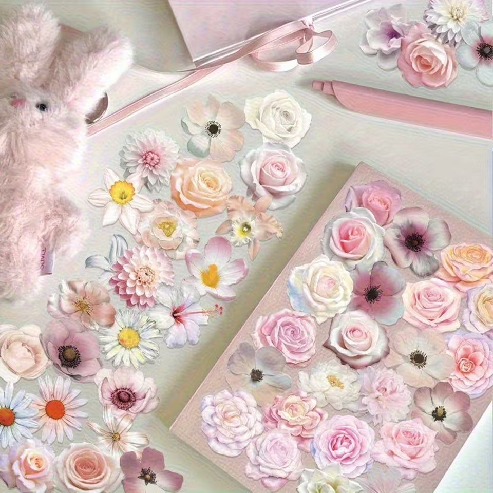 un lot de 20 stickers en forme de fleurs diverses et variées dans des teintes de couleurs roses pâles et blanc. Effet vintage, romantique et douceur florale. Idéal pour le scrapbooking.