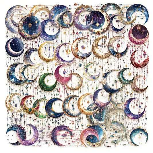des stickers en forme de lune coloré et décorées de détails dorés, des pampilles et strass colorés et brillantes y sont suspendus