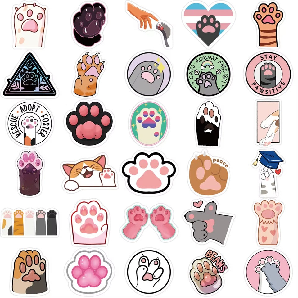 des stickers en forme de pattes de chat colorées et diverses. Idéal pour tous les projets créatifs.