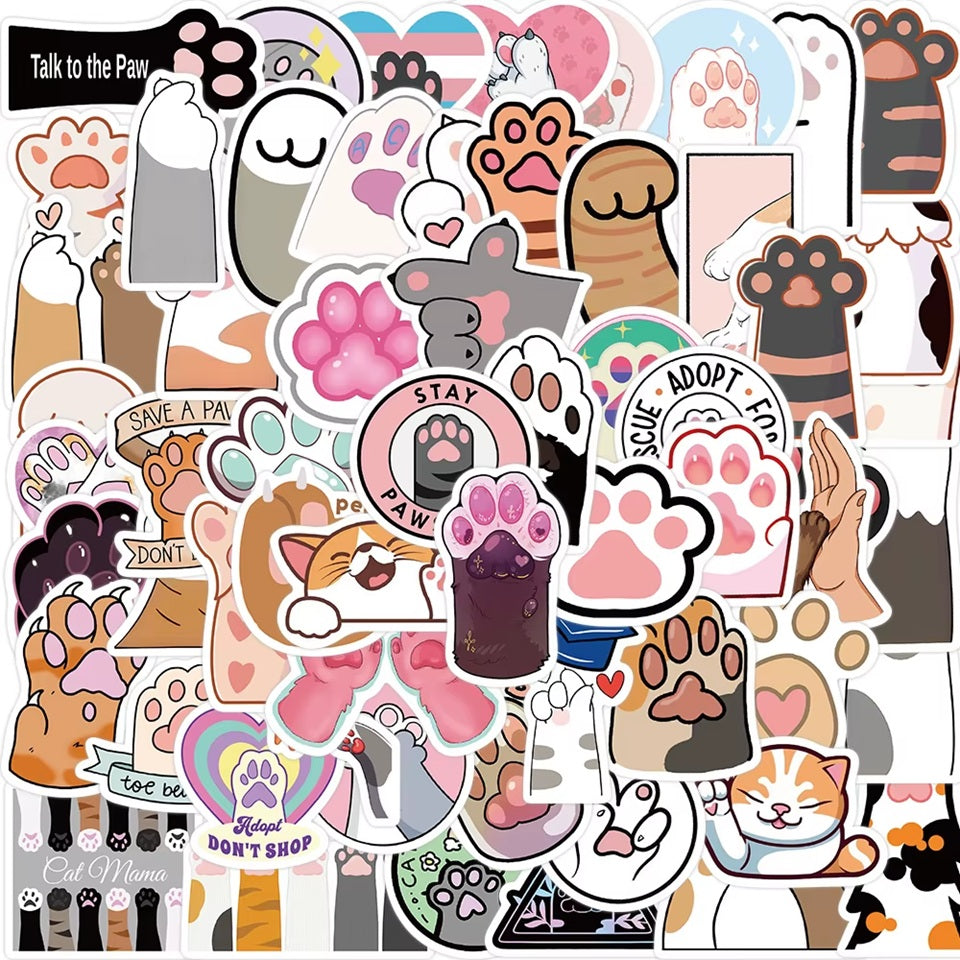 des stickers en forme de pattes de chat colorées et diverses. Idéal pour tous les projets créatifs.