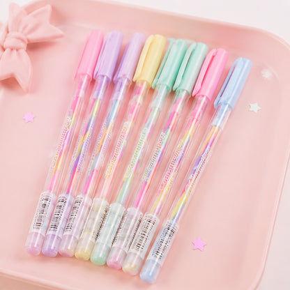 Lot de stylos rainbow kawaii aux jolies couleurs pastel présenté sur un plateau rose adorable ✨ Stylos gel multicolores bleu, rose, jaune, vert et violet avec design transparent et ambiance douce inspirée de la papeterie japonaise. Parfaits pour écrire, dessiner ou décorer un journal avec une touche cute et colorée.