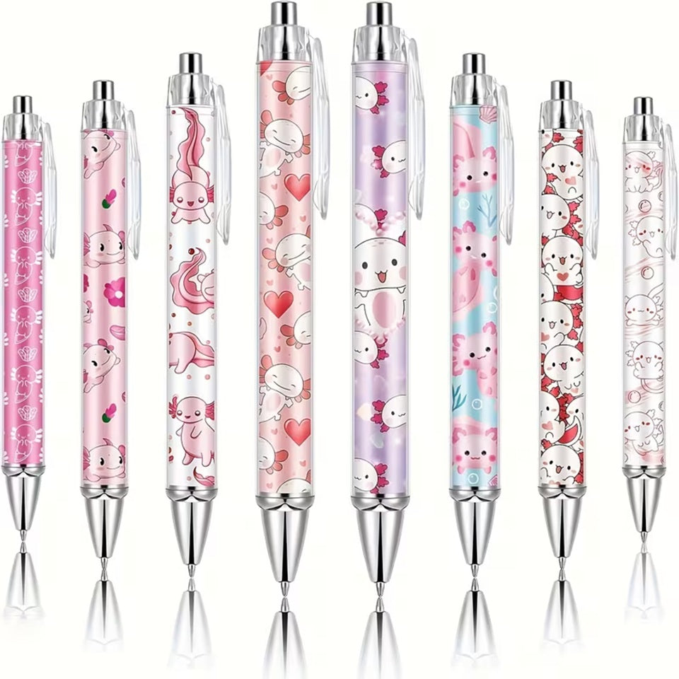 des stylos colorés dans les tons roses mauves blancs illustrés d'axolotl trop mignons !