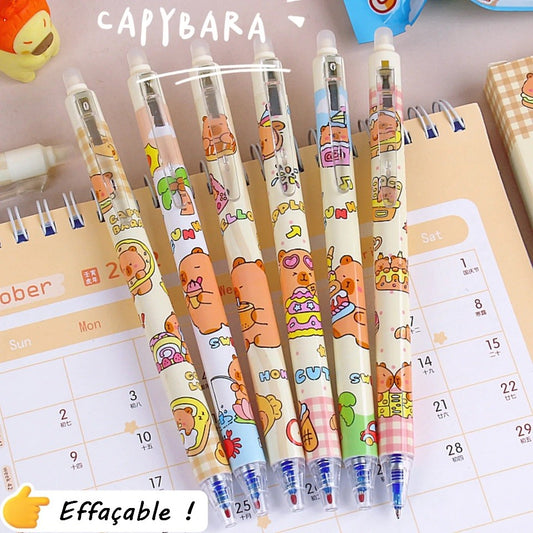 des stylos au design de capybara ultra gourmands qui dégustent des glaces, donuts, gâteaux et autres gourmandises sucrées. Ils sont effaçables !