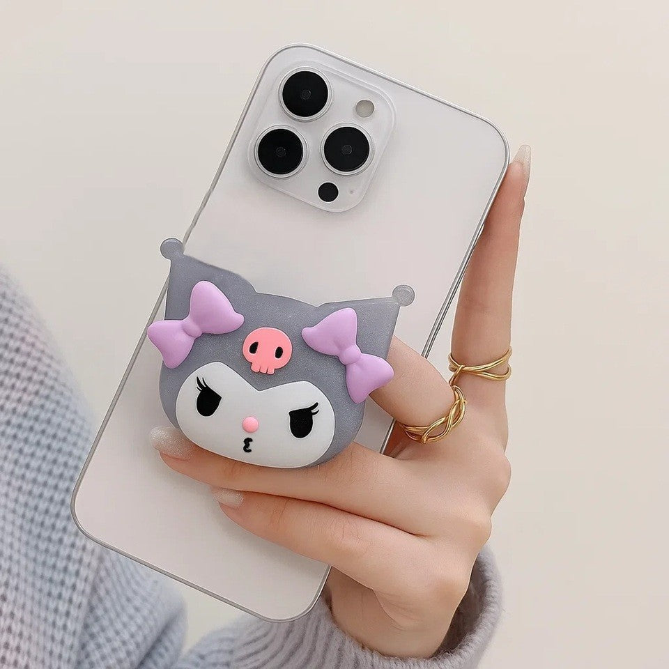 un support grip phosphorescent pour smartphone en forme de l'espiègle Kuromi ! 