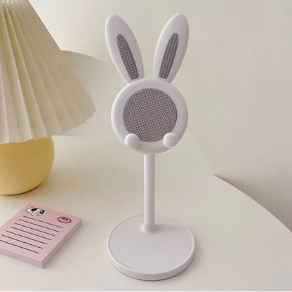 un support pour smartphone et tablette doté d'oreilles de lapin toutes choupi. Il est télescopique et s'adapte à tous les appareils. Idéal également élément de décoration