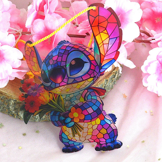 une décoration à suspendre en forme de stich tout coloré façon mosaïque