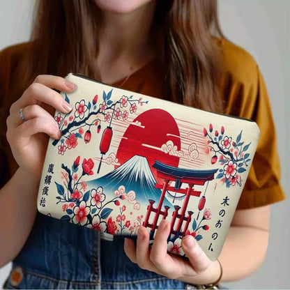 une trousse de toilette au motif japonais : mont fuji, soleil rouge, tori et fleurs de sakura