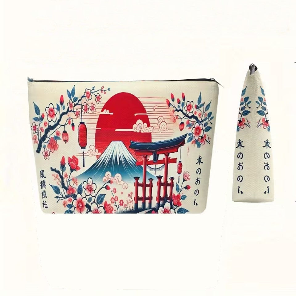 une trousse de toilette au motif japonais : mont fuji, soleil rouge, tori et fleurs de sakura